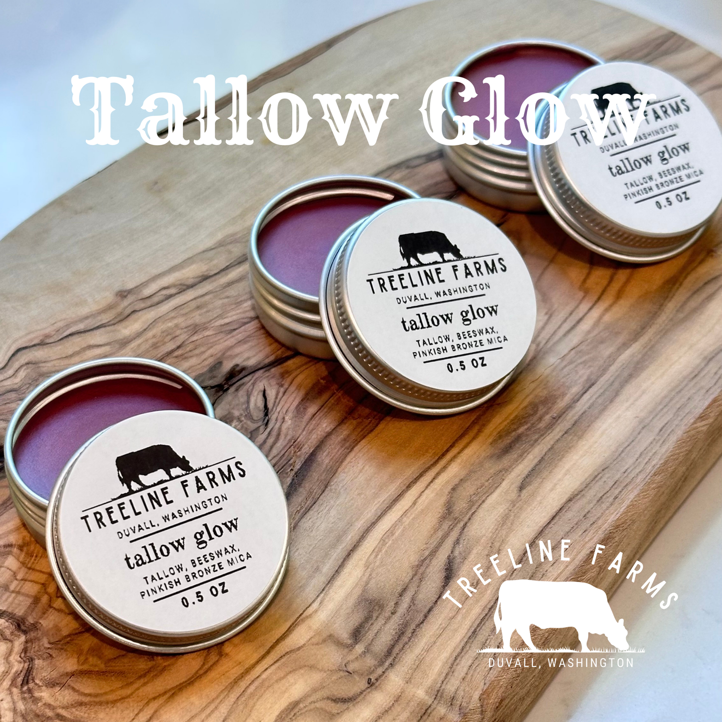 Tallow balm containers with 'Treeline Farms' branding on a wooden surface.