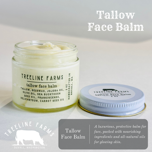 Creamy tallow face balm in a clear glass jar with clean, black text of the Treeline Farms branding and list of ingredients, on a light background.